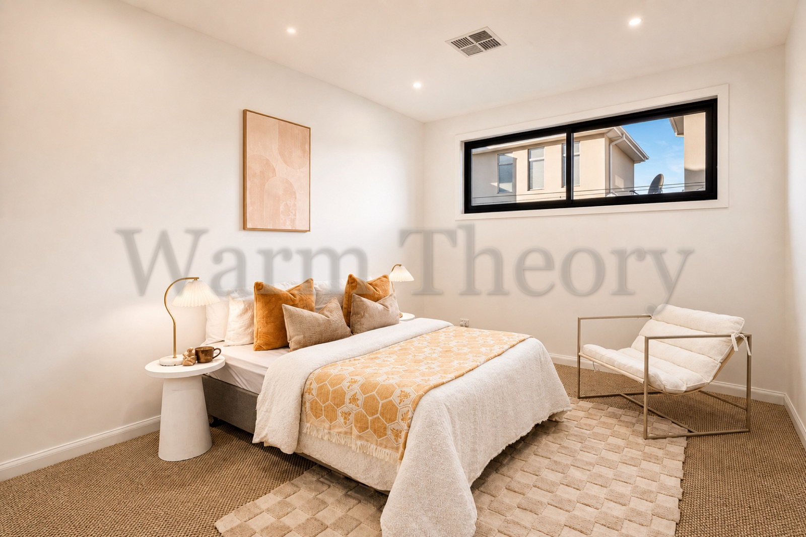 Bedroom in ochre and caramel tones with a honeycomb bed runner, mushroom lamps, a sling chair, and a checkerboard rug